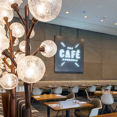 Inside the Cafe focusing on the lighted logo sign