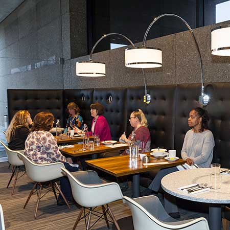 Guests dining in our banquette seating